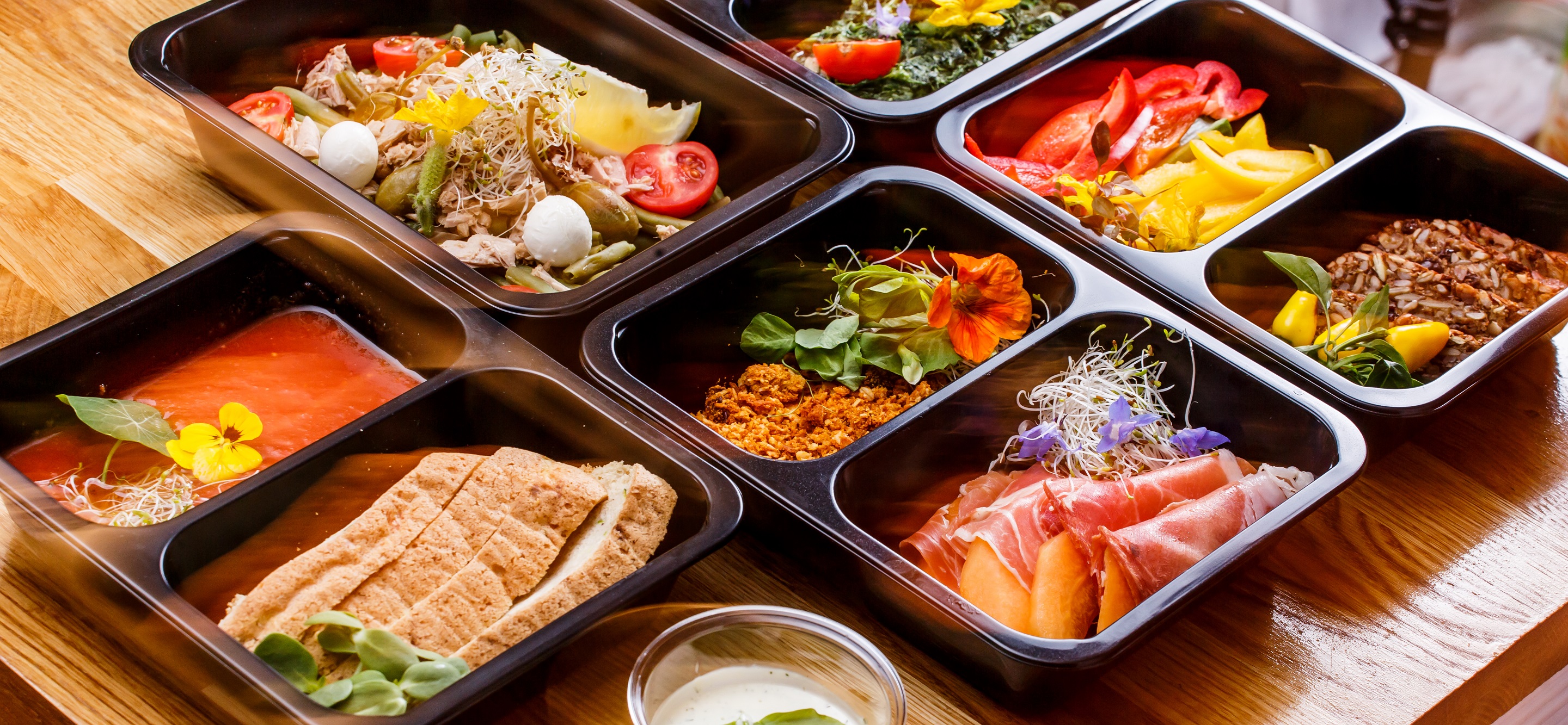 food trays on table med Teinnovations