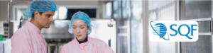 SQF inspectors examining food safety line